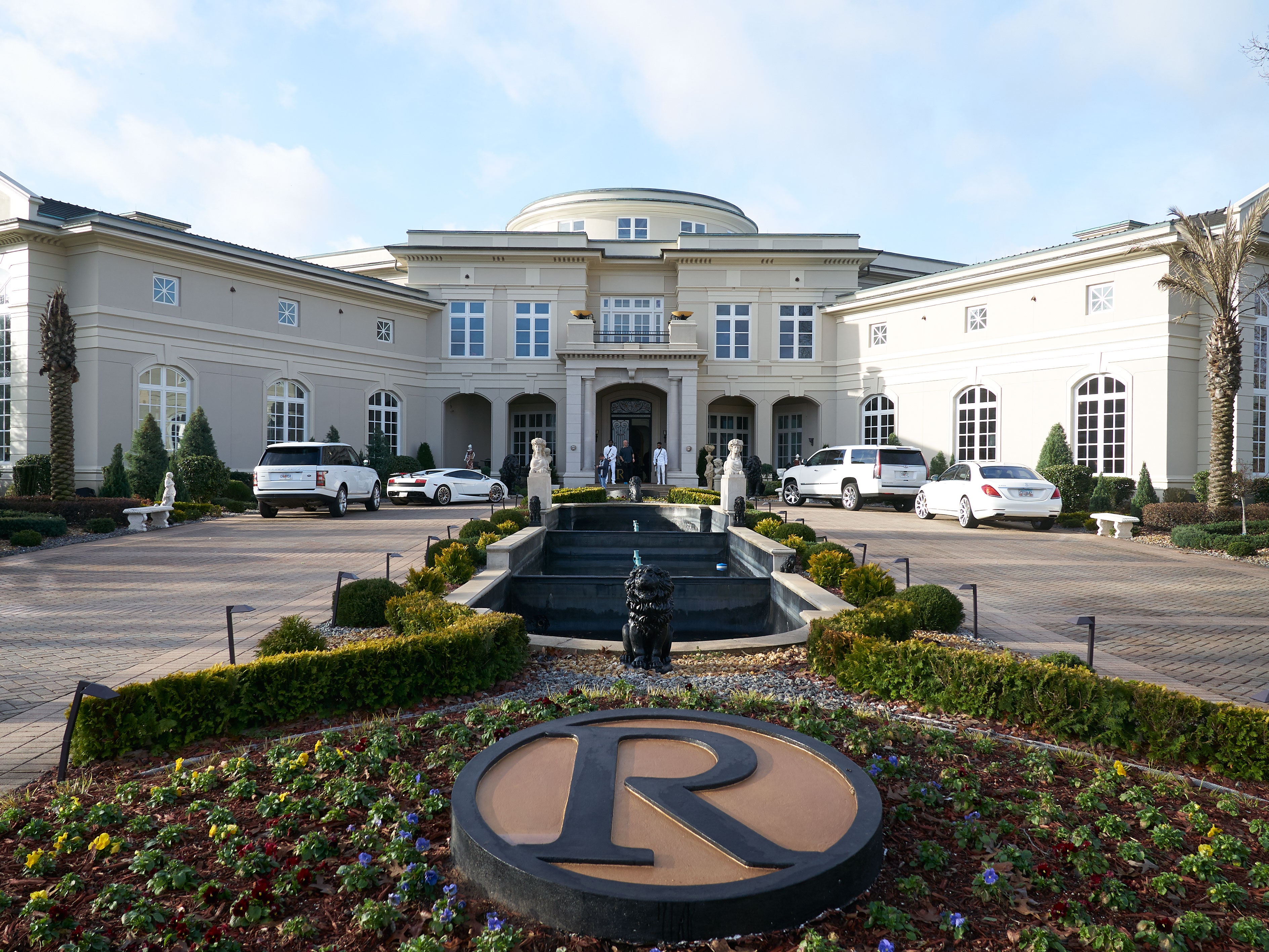 See Rick Ross House Pics: A Tour of His Luxurious Estate.