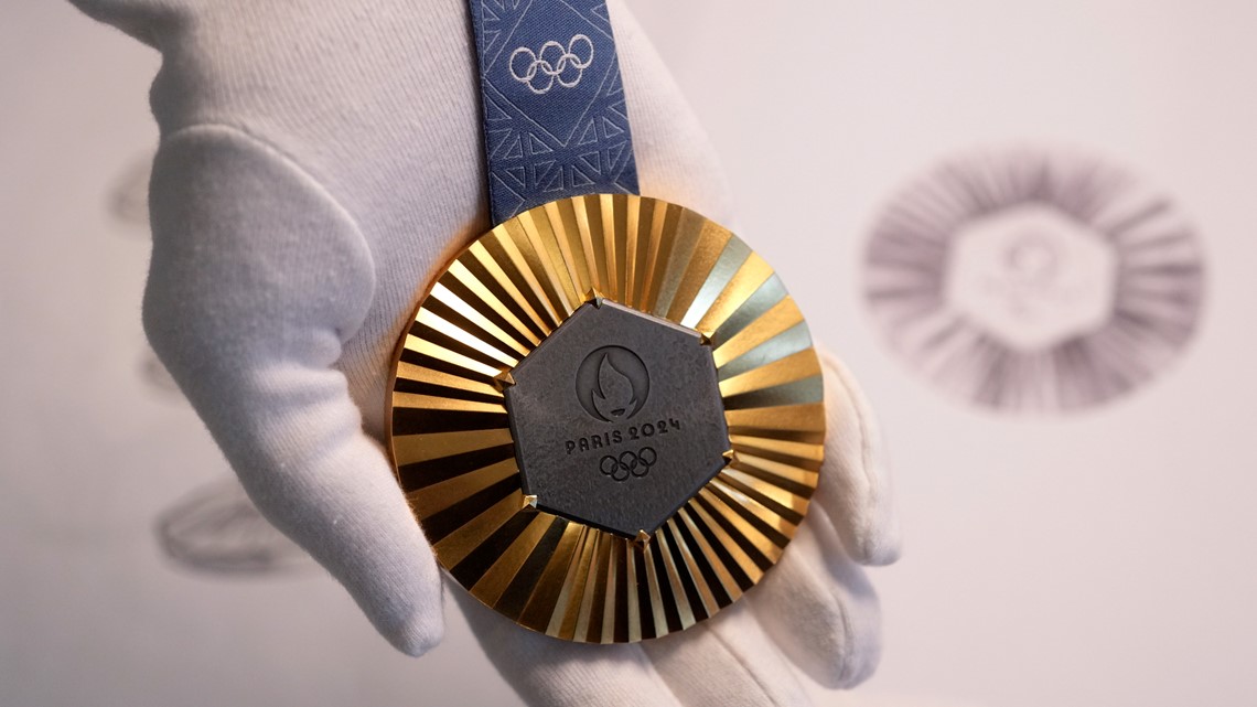 People often ask is Olympic gold medals real gold? Learn exactly how much precious metal is inside.