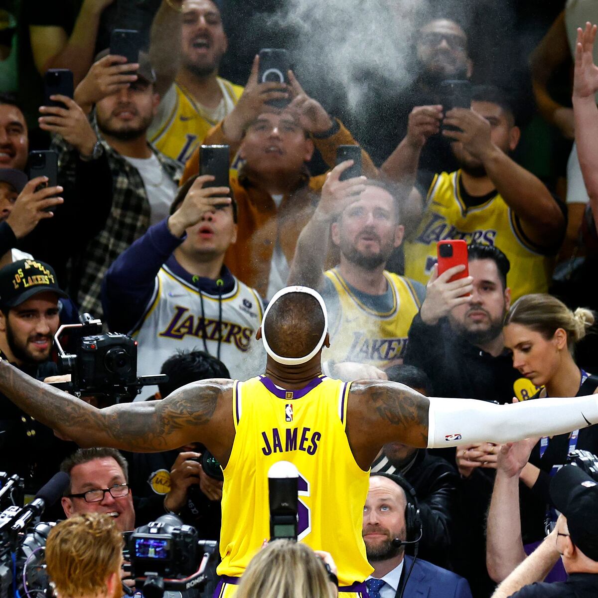What is the real story behind the iconic lebron chalk toss pregame ritual?
