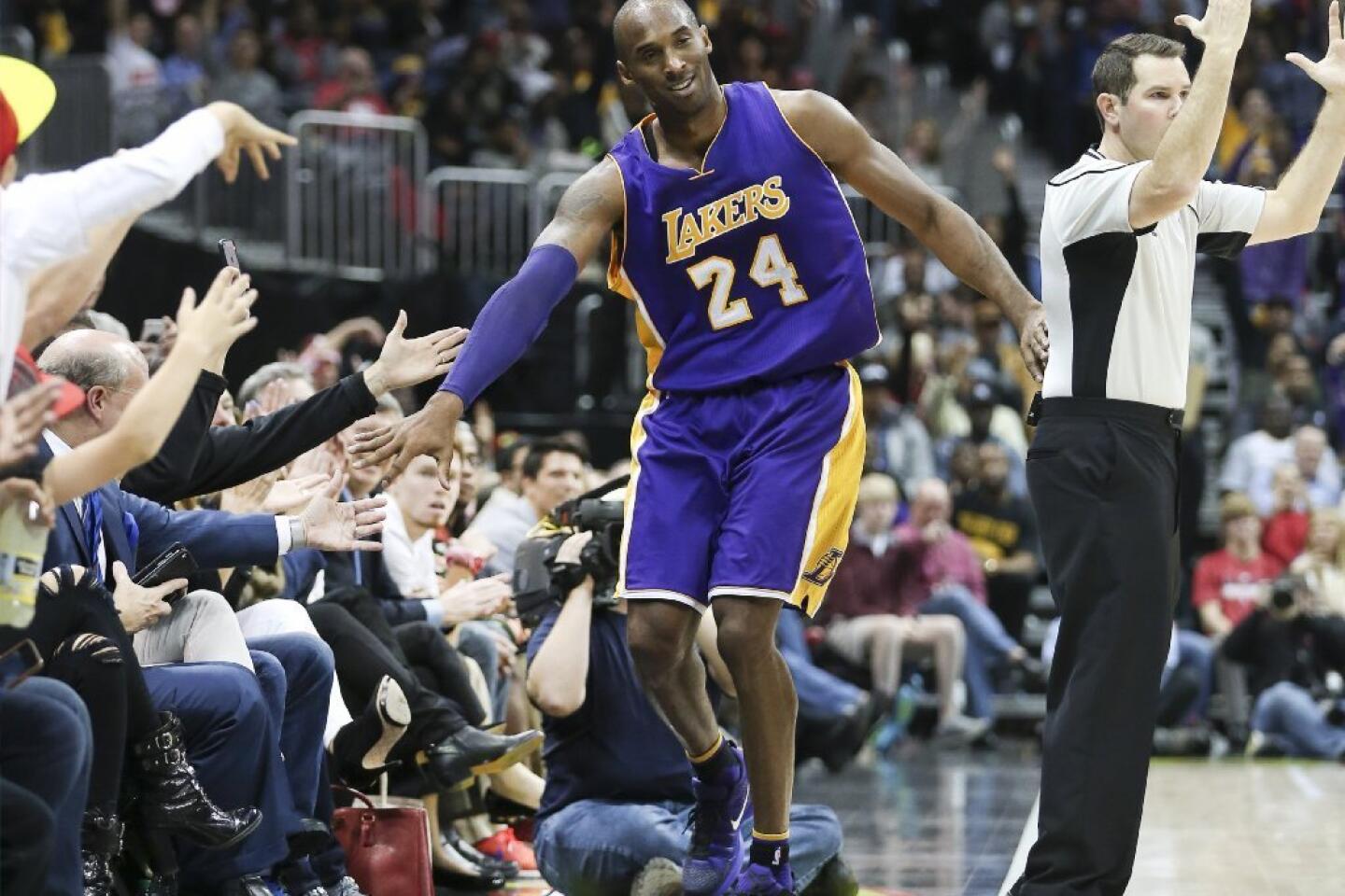 Lets discuss playing styles: How different were Kobe Bryant and Magic Johnson on the basketball court? Analyzing their unique skills.