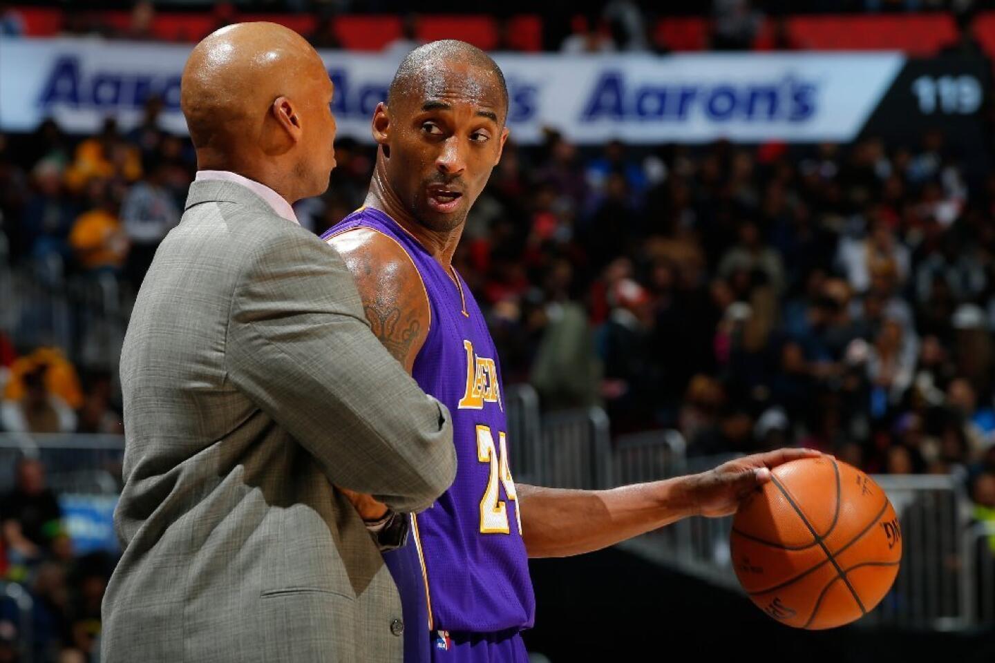 Lets discuss playing styles: How different were Kobe Bryant and Magic Johnson on the basketball court? Analyzing their unique skills.